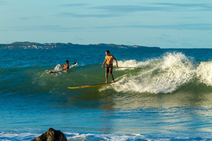 Man surfing wave at An Bang beach